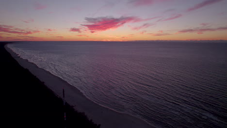 drone shot of beautiful and colorful sunset over baltic sea in poland
