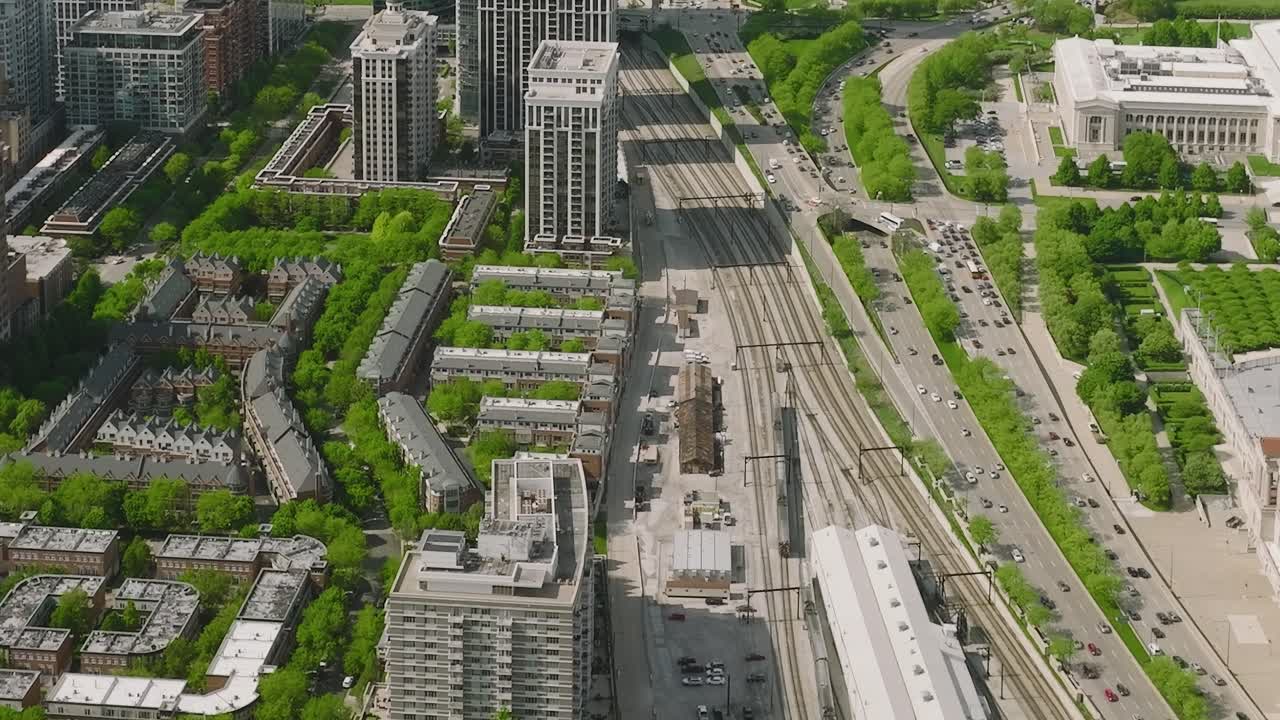 View of Chicago's train lines and buildings from above during the day