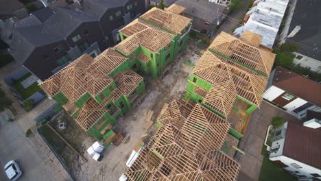 bird’s eye drone view of residential construction site in progress