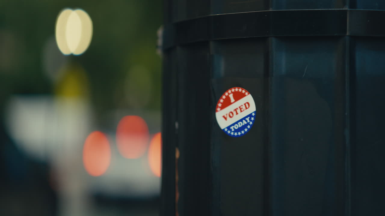Images of a hand placing an "I Voted" sticker on a street pole, promoting civic engagement and participation in elections