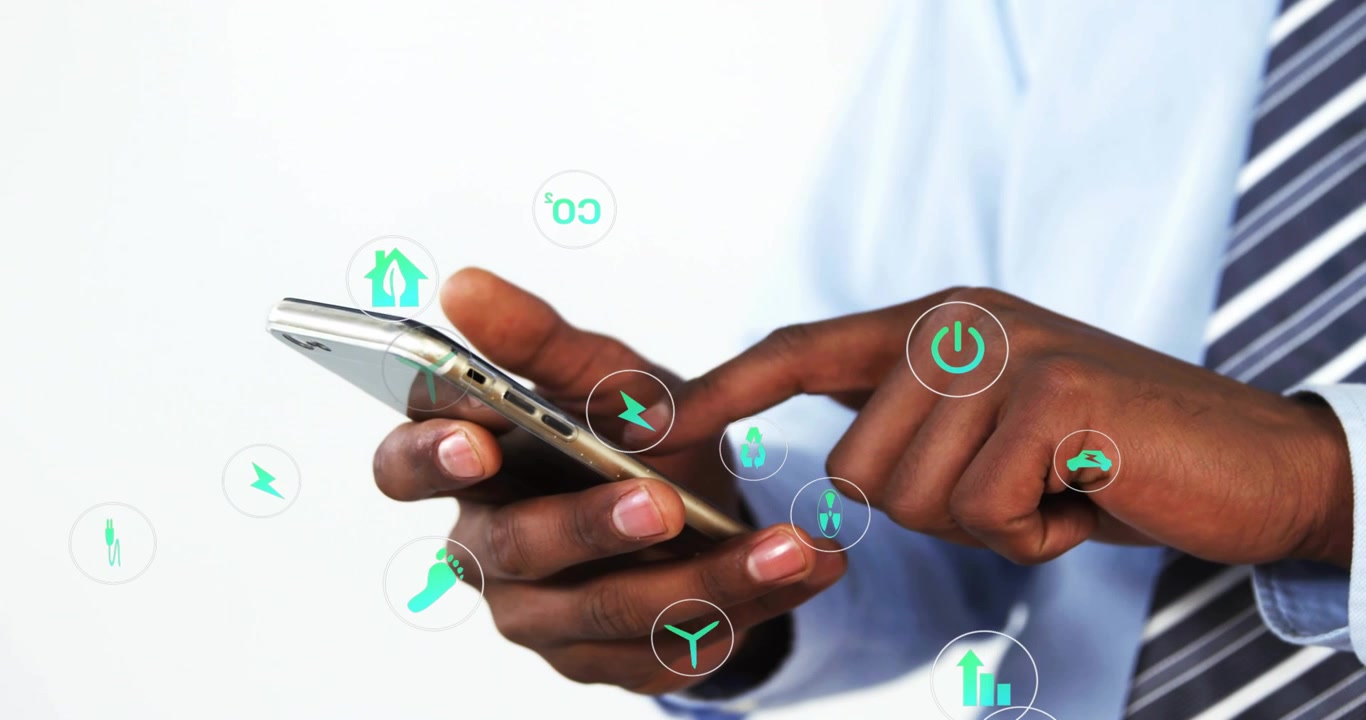 Homem segurando o telefone e tocando com o dedo, criando ícones verdes ao redor do telefone para análise financeira