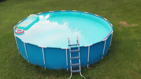 flight over above ground swimming pool