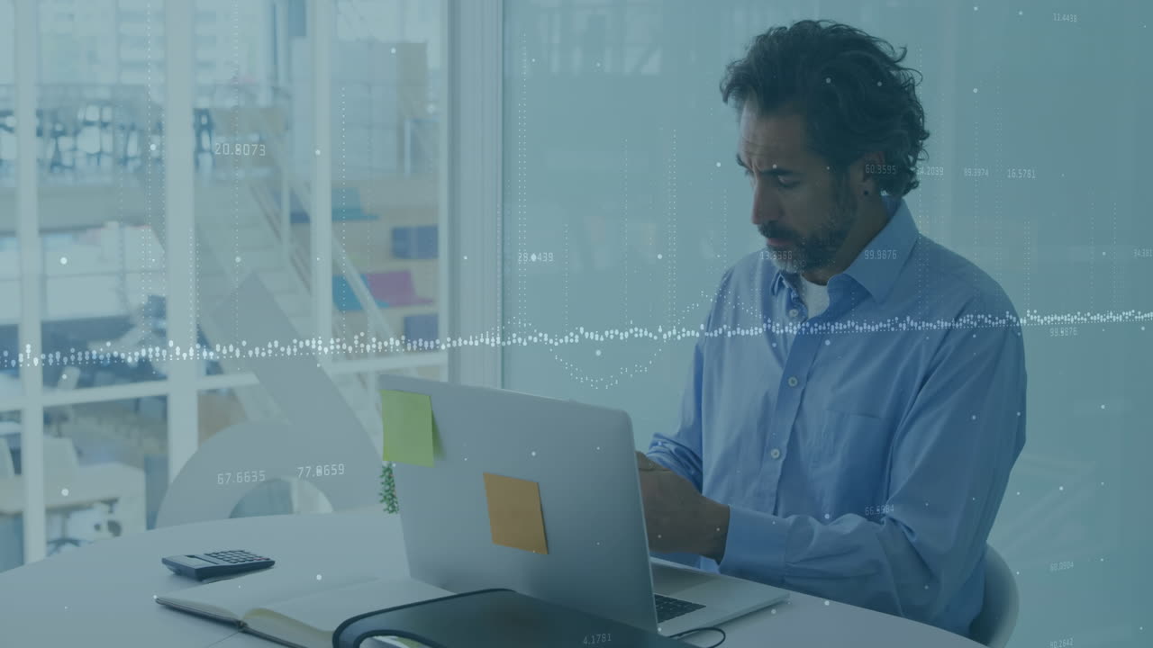 Financial data processing over caucasian man working on laptop in office