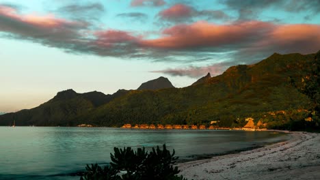 timelapse of moorea with sunsetting over the mountain