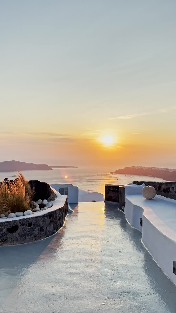 Santorini Sunset Over the Aegean Sea with White Structures