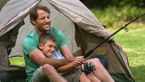 father fishing with his son