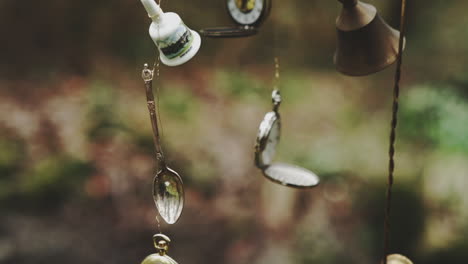 pocket watches and bells hanging in art installation