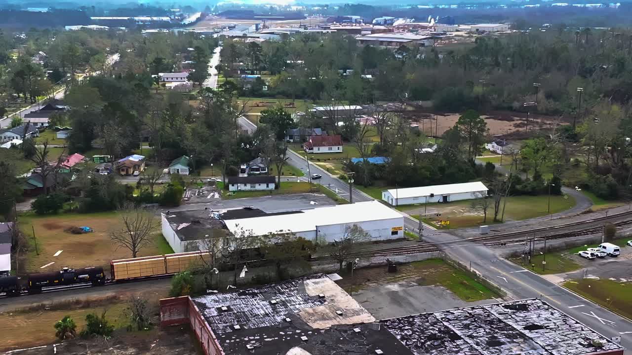 Industrial Cargo Train Moving On Railway In Valdosta, Georgia, USA. aerial shot, slow motion