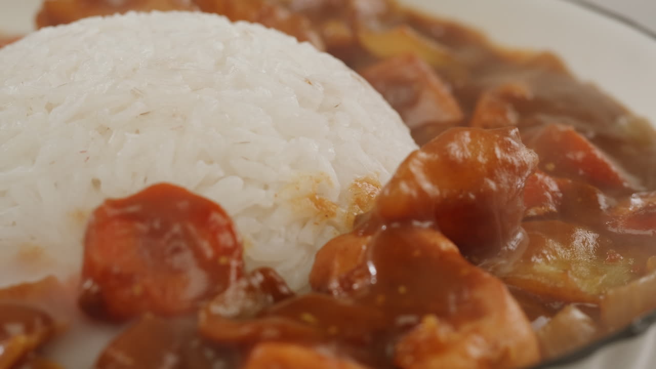 Japanese curry rice with fry pork Tonkatsu, Katsu Kare, Japanese breaded cooking dinner in restaurant, close up macro of asian food