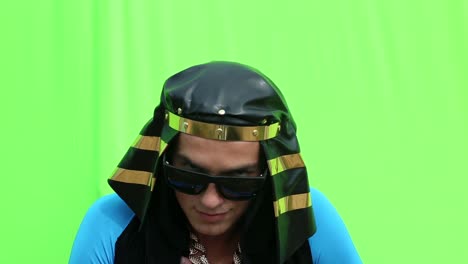 man in pharaoh costume against green screen