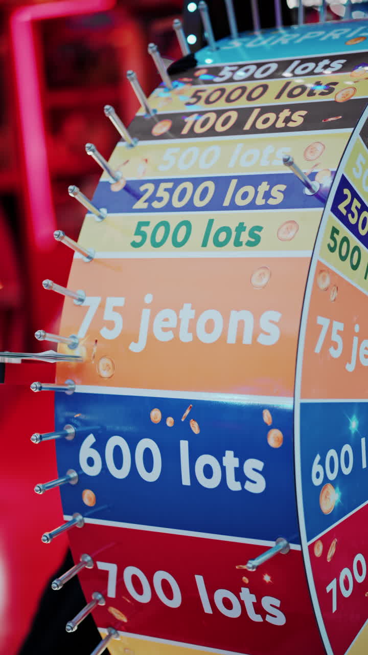 Wheel of fortune at an amusement park. Vertical