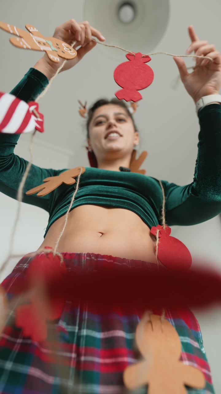 Woman with Christmas Ornaments