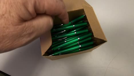 unpacking pens from the box