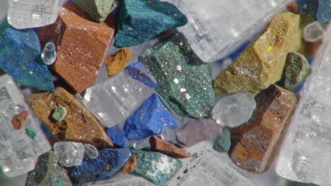 stunning macro view of colorful mineral crystals and gemstones with glittering surfaces capturing light and detail in a close-up perspective