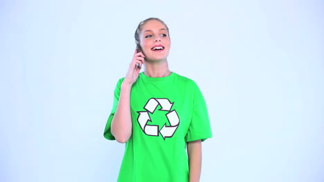 smiling environmental activist talking on the phone