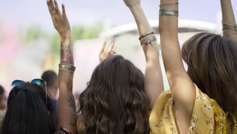 group of women dancing at music festival