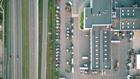 aerial shot on a logistics park with a warehouse - a loading hub