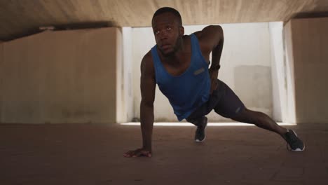 man exercising in an urban setting