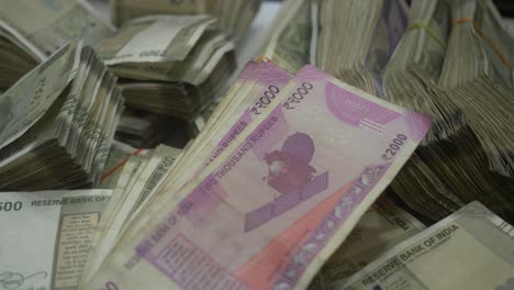 indian rupee banknotes of 2000 and 500 value, stack of indian rupee, closeup