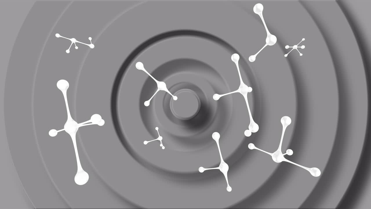 회색 배경 위에 떨어지는 분자의 애니메이션