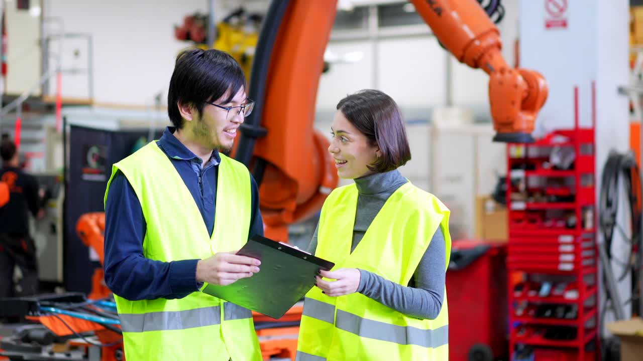Engineers inspecting manufacturing process