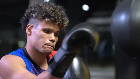 man boxing training session