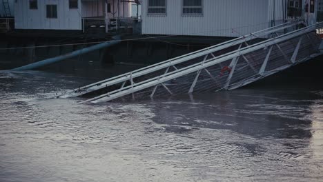 submerged ramp alongside the danube, partially under floodwaters in budapest