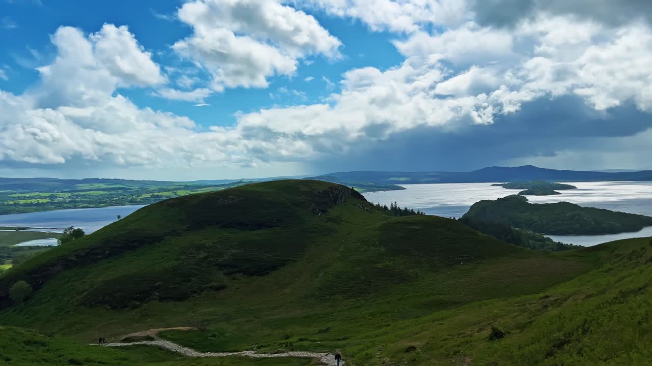 Green Slopes In The Dramatic Landscape Of Quiraing On The Isle Of Skye, Scotland. Panning Shot