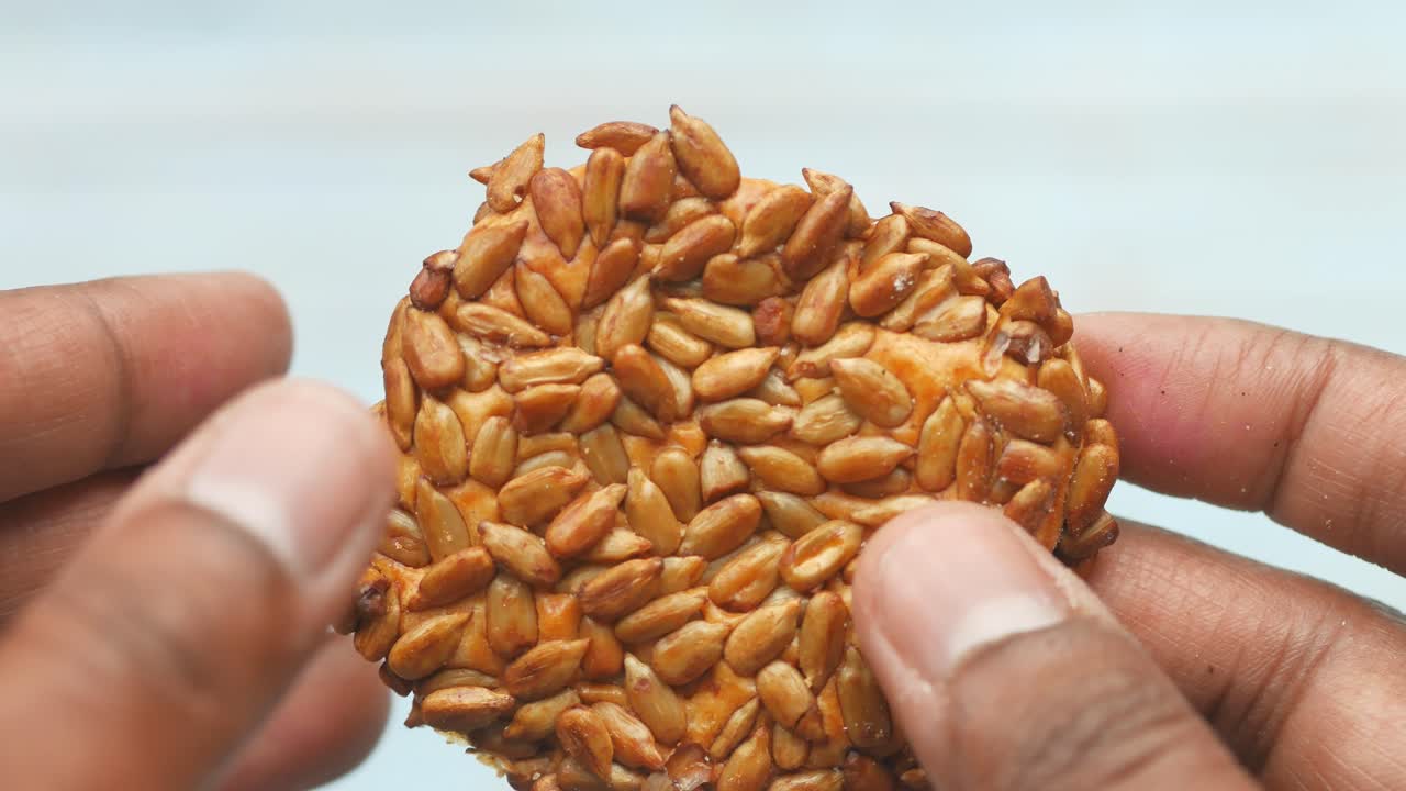 Crispy Sunflower Seed Cookies in Hands