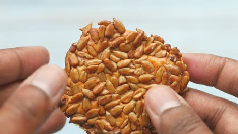 crispy sunflower seed cookies in hands