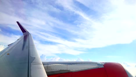 commercial airplane maneuver through beautiful blue sky