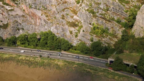 view down onto a road and cliff face by the river avon