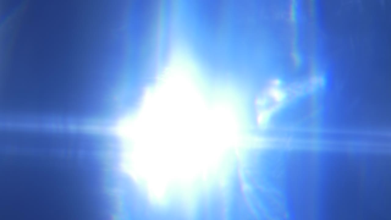 Bright Blue Optical Flare Appearing and Fading