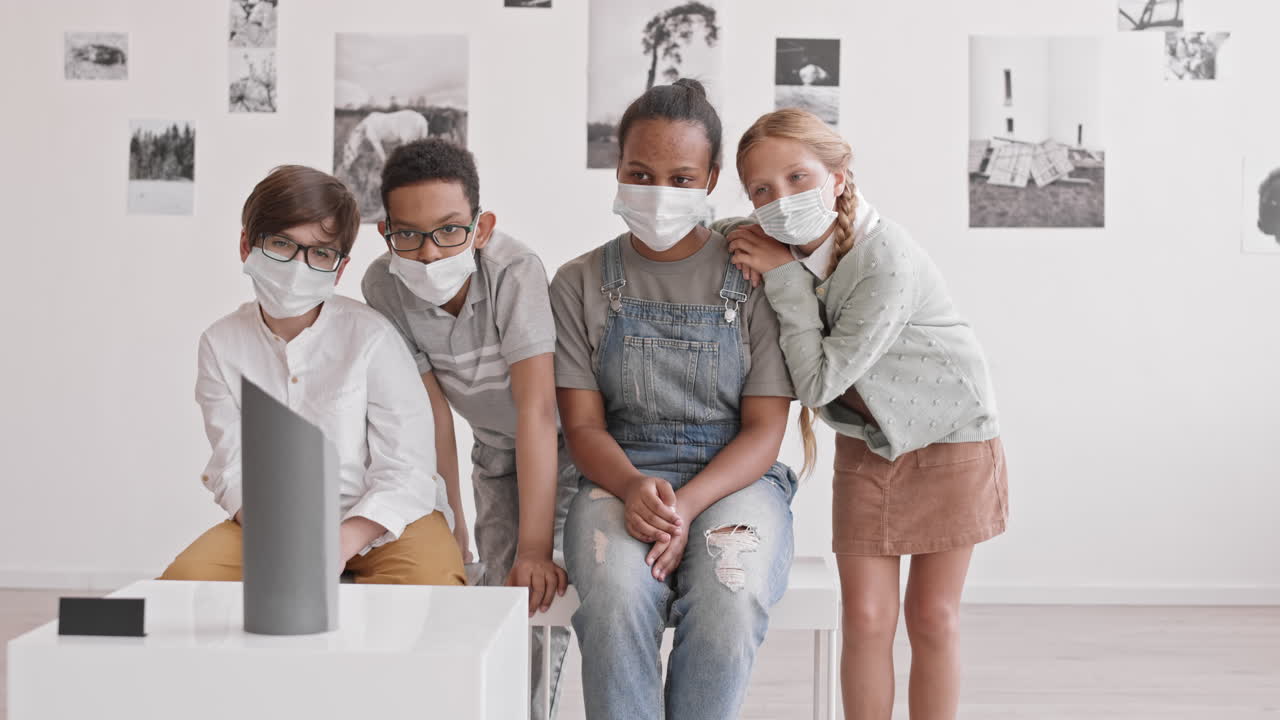 School Friends Looking at Art Object