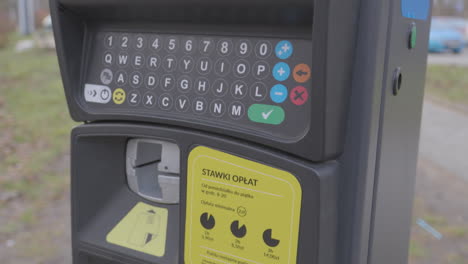 modern parking meter with display and keypad