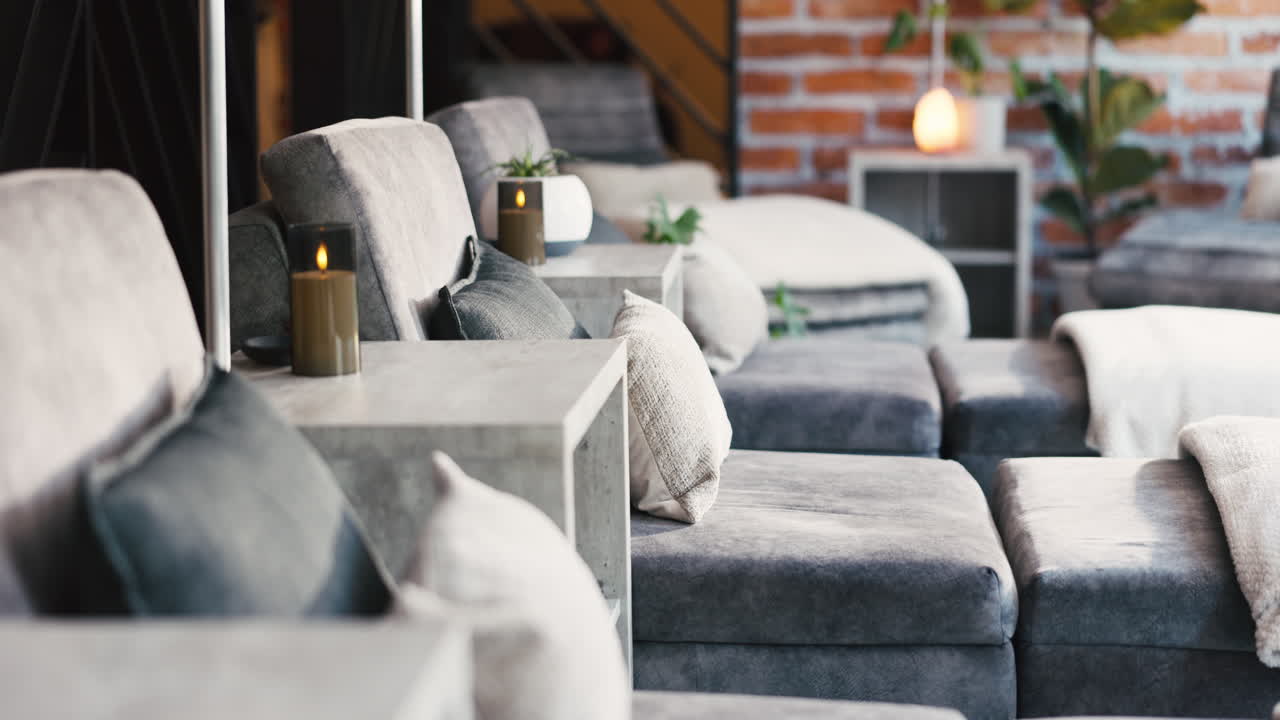 Cozy Modern Lounge Area with Comfortable Sofas and Warm Lighting