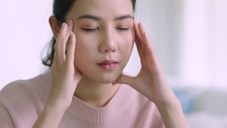asian woman feel tired overworked stretching for break time relax