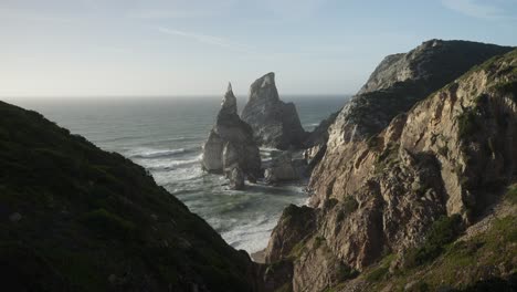 coastal view of dramatic cliffs and sea stacks