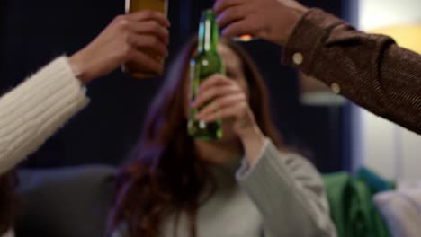 Friends-At-Home-Or-In-Bar-Celebrating-At-St-Patrick's-Day-Party-Drinking-Alcohol-With-Snacks-In-Foreground