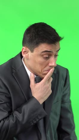 Businessman Thinking and Pondering on Green Screen