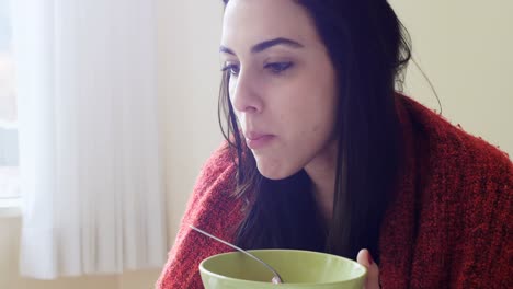 beautiful woman using laptop while having breakfast 4k