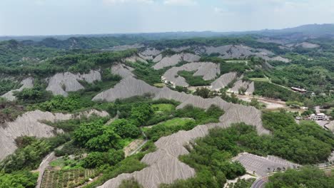 aerial flyover epic badlands of tianliao moon world during sunny day, taiwan, asia, tianliao moon world, 田寮月世??