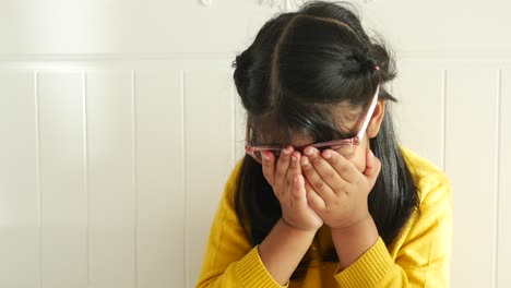 a young girl crying