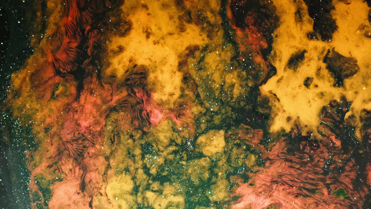 Macro shot of vivid colors blending, creating a dynamic abstract texture