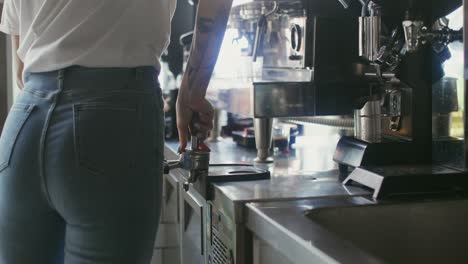 barista making coffee