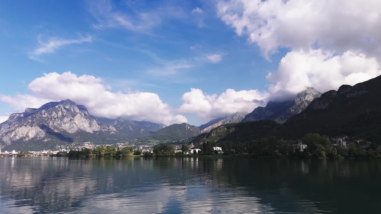 Fly sideways, drone view of Lecco and Lake Garlate, Italy