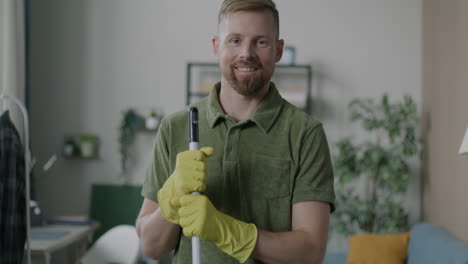 man mopping a house