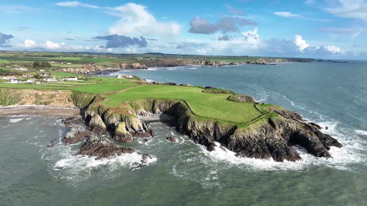 Epic drone panning shot of Dunabrattin Head Copper Coast Waterford winter storm