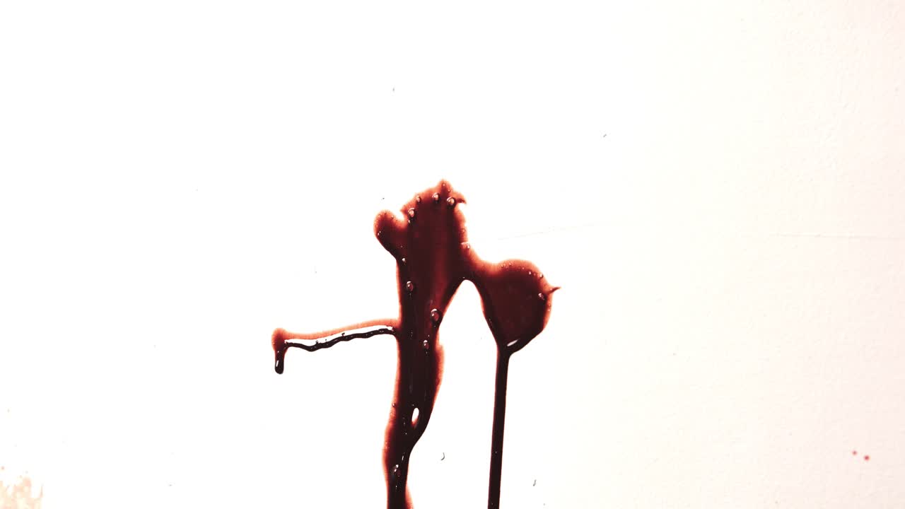 Red Fake Blood Fired Against White Wall. Shiny Thick Liquid Spatter Dripping Under Bright Light. Slime Texture for Horror. Violent Crime Scene Halloween Spooky Background