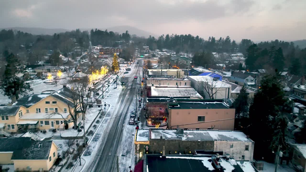 aerial push in over Blowing Rock NC, North Carolina in snow